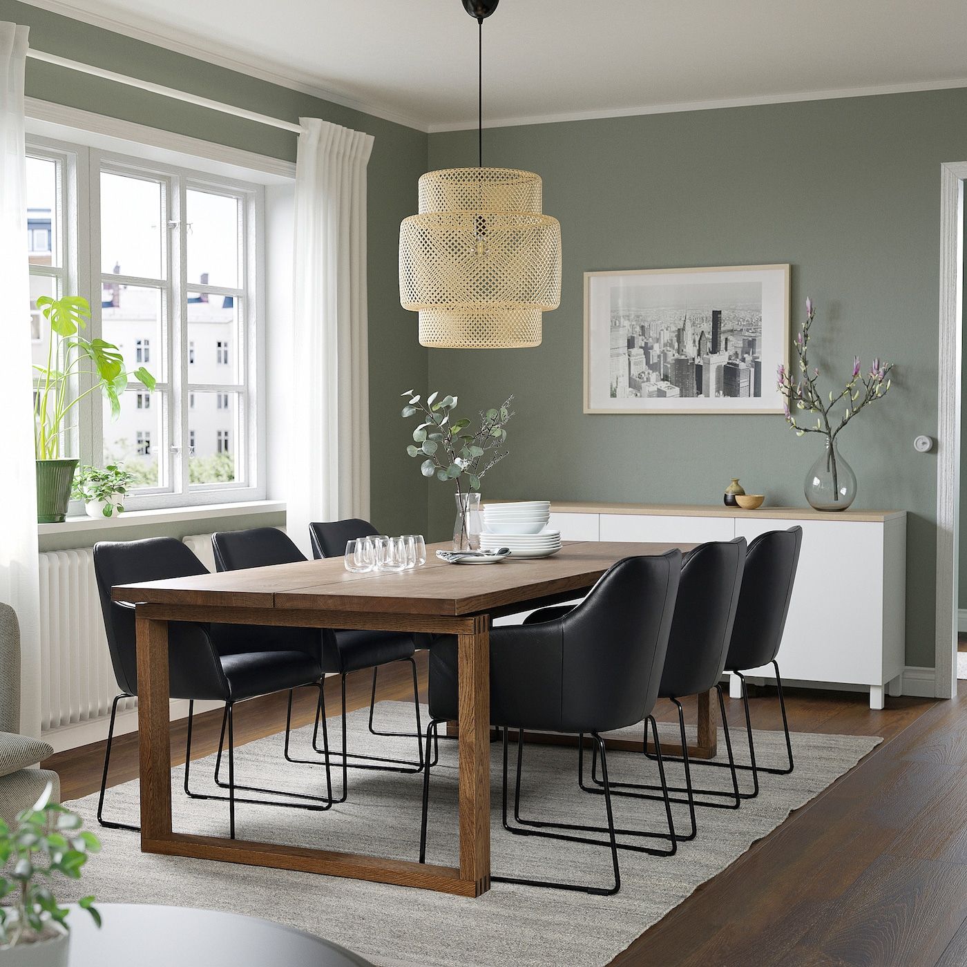 Modern Scandinavian Dining Room with Wood Table and Green Walls