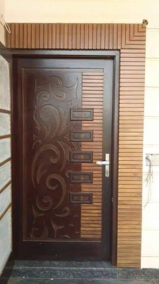 Modern Wooden Entry Door with Carved Swirls and Rectangular Glass Insets
