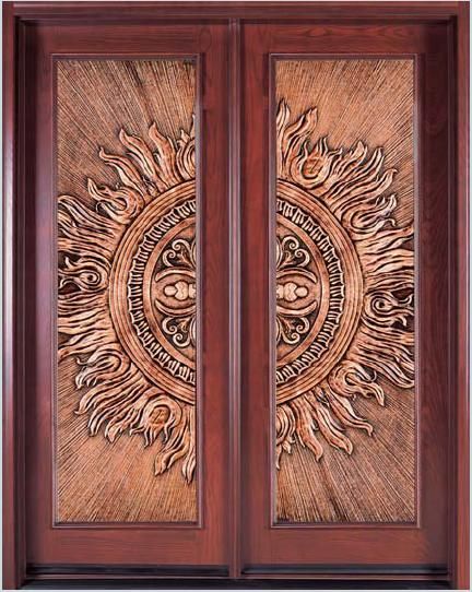 Double Wooden Entry Doors with Ornate Sunburst Carving