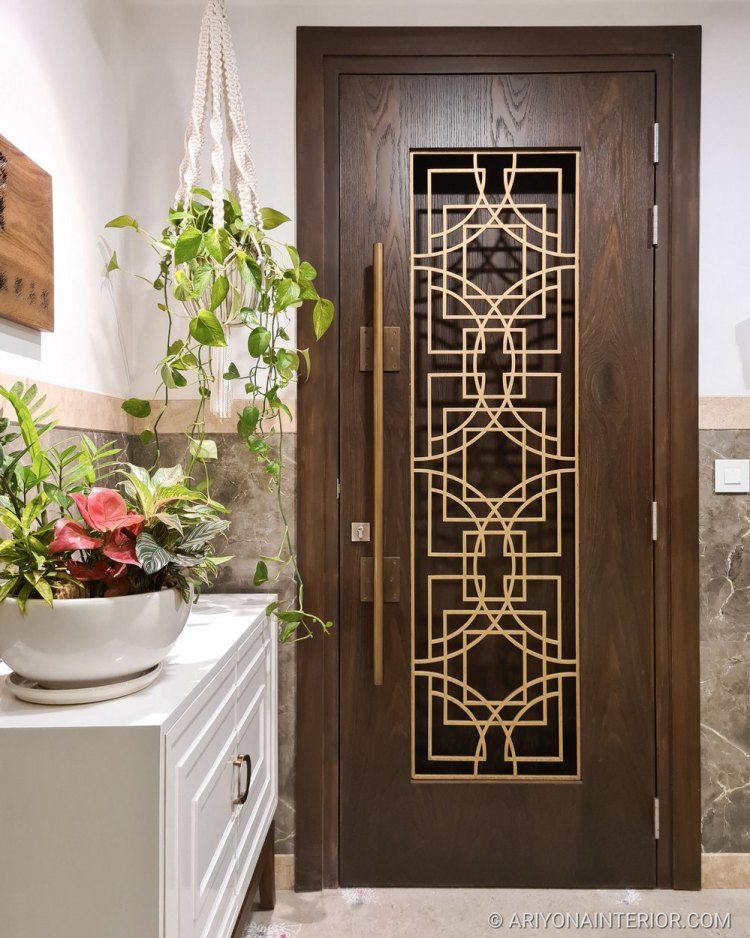 Modern Entry Door with Geometric Brass Inlay