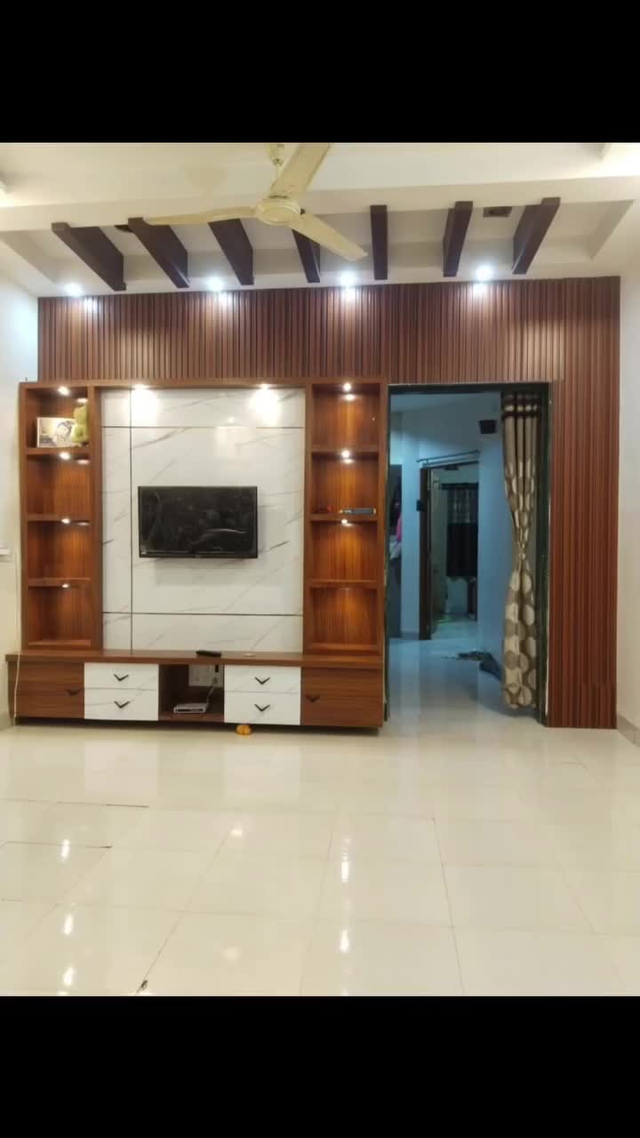Modern Living Room TV Wall Unit with Wood Paneling and Open Shelves