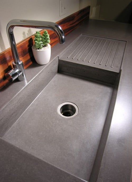 Modern Concrete Kitchen Sink With Integrated Drainboard and Chrome Faucet