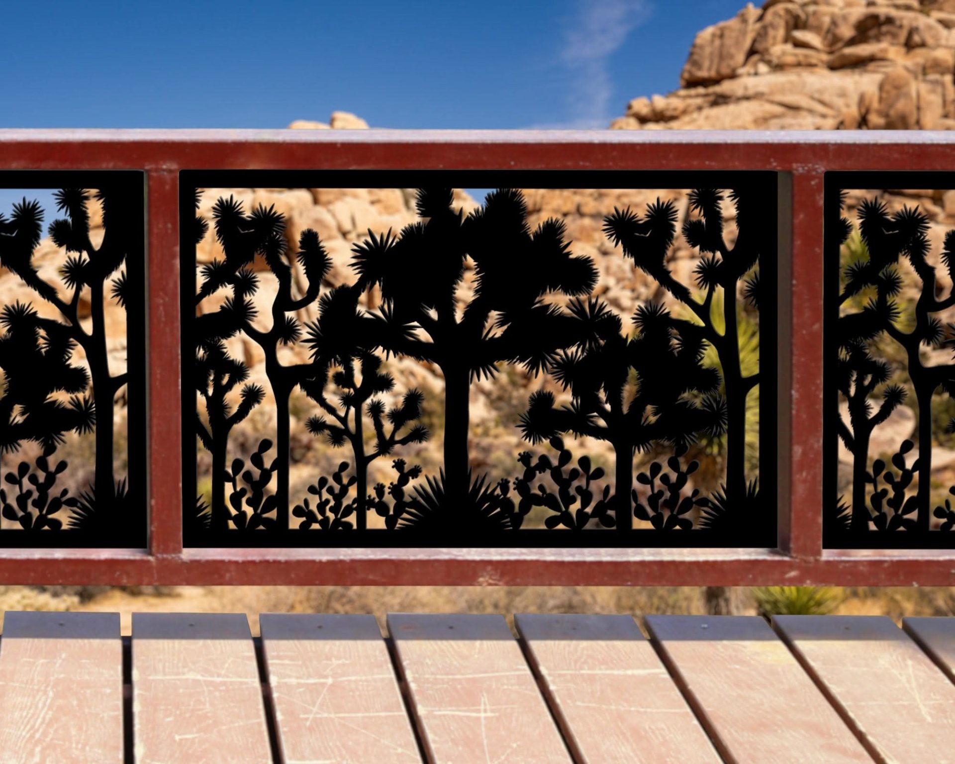 Desert-Inspired Metal Railing with Silhouette Cutouts on Wooden Deck