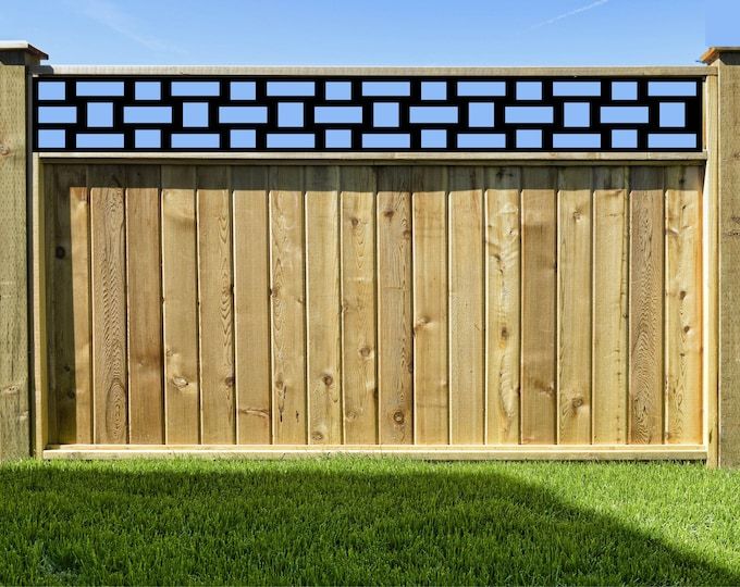 Modern Wood Privacy Fence with Decorative Geometric Top Panel