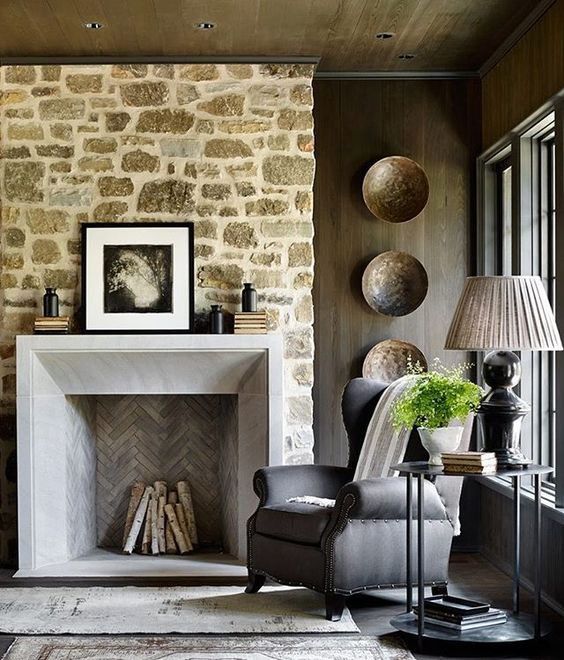 Cozy Living Room with Stone Fireplace and Modern Rustic Accents